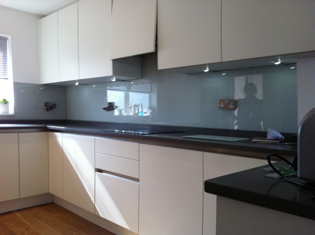 Grey glass kitchen splashback with LED lighting in Buckingham