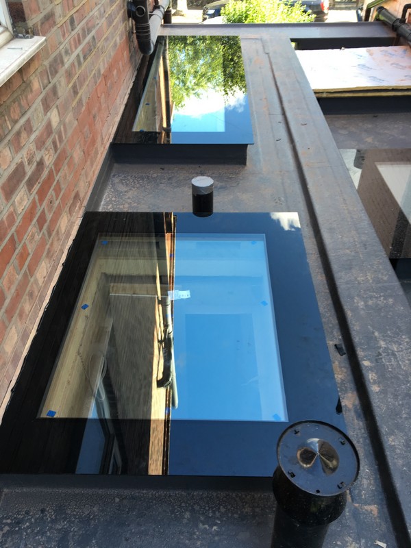 Multiple flat roof skylights on extension in Buckingham